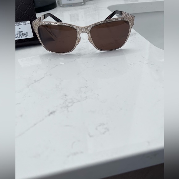 New with tags and case Gucci GG4267 ladies sunglasses.